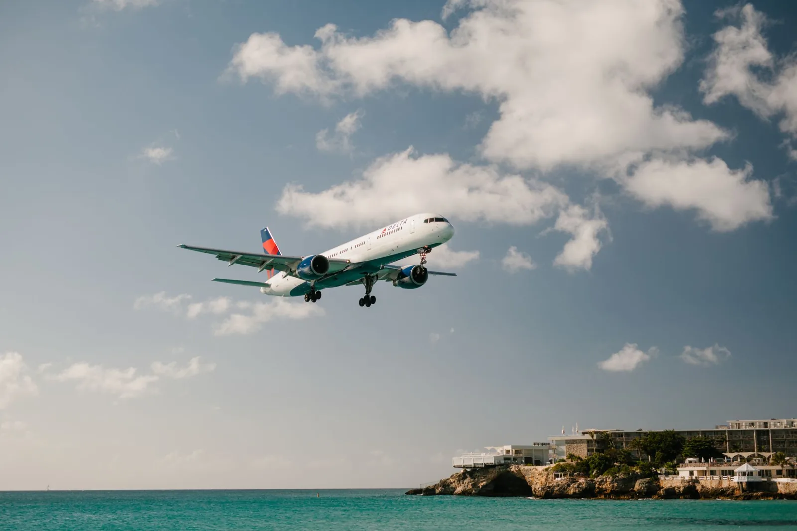 Traveler booking a last minute flight deal on a phone