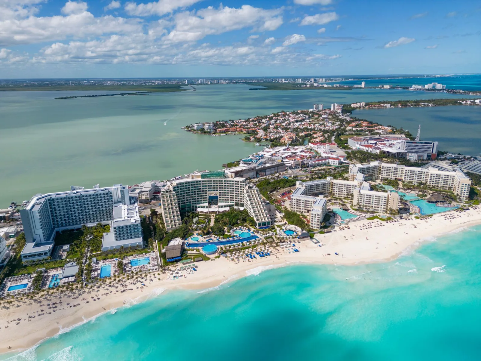 Luxury beach resort deals with an infinity pool overlooking the ocean at a five-star resort