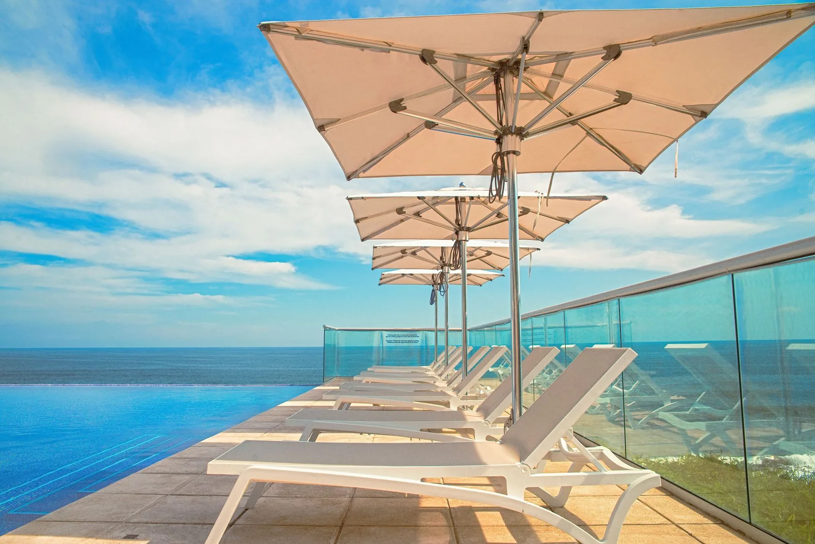 All inclusive resort vs hotel cost comparison on a beach
