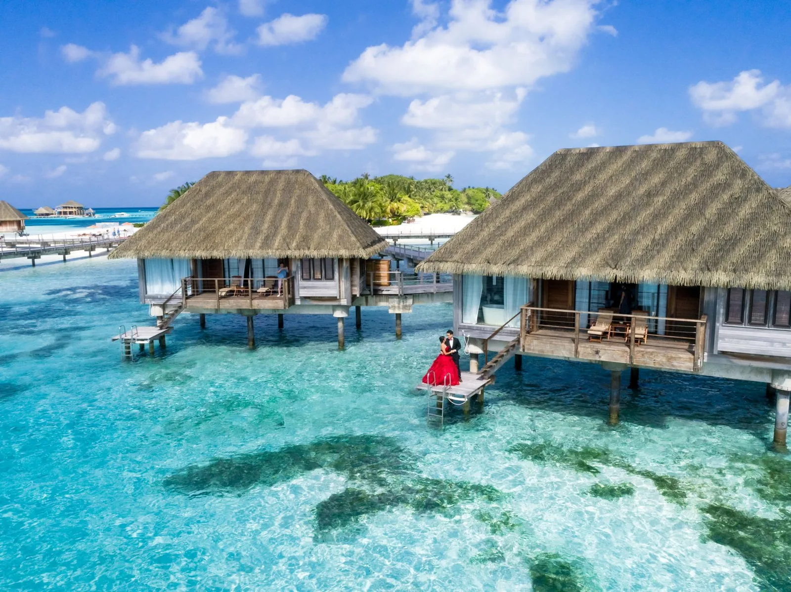Couple enjoying a honeymoon resort package abroad