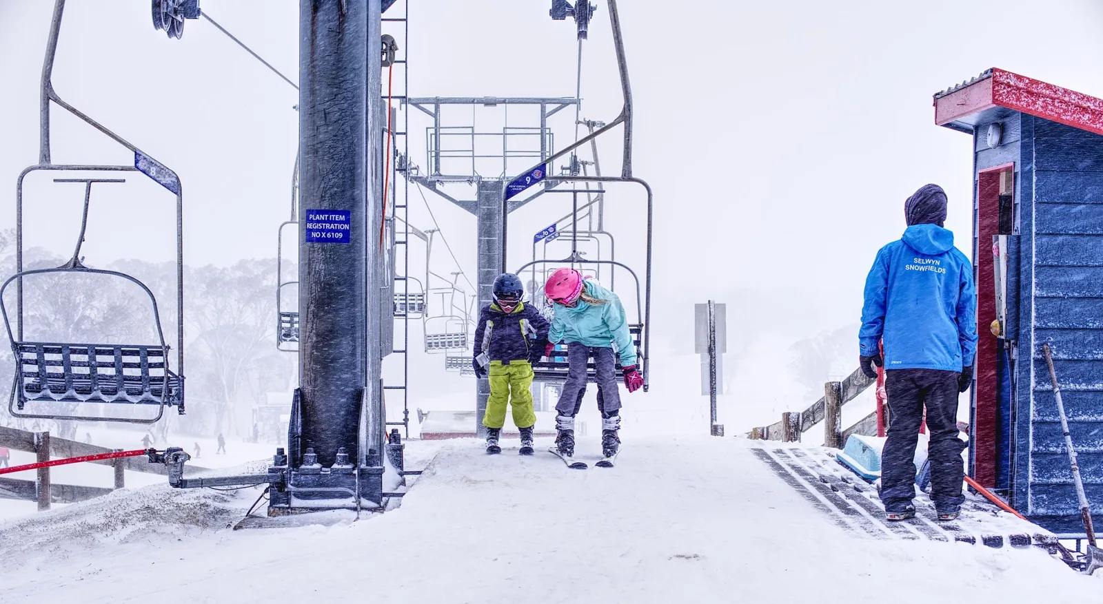 Skiers comparing lift ticket and rental options in a package